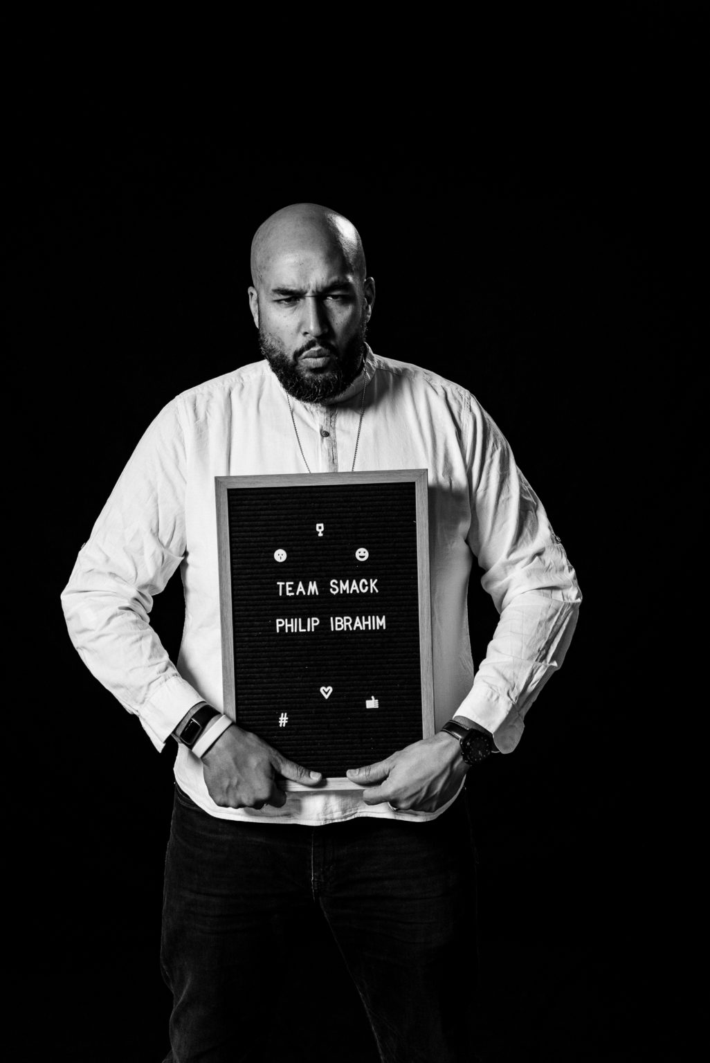 Philip Ibrahim posing with a sign