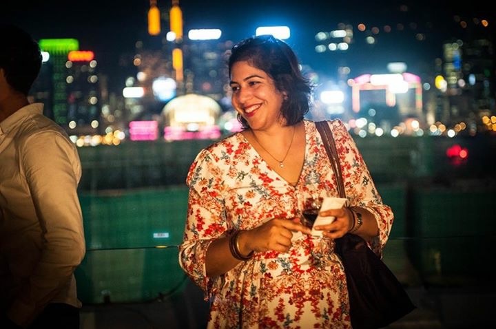 Naureen Ahmed smiling at an event